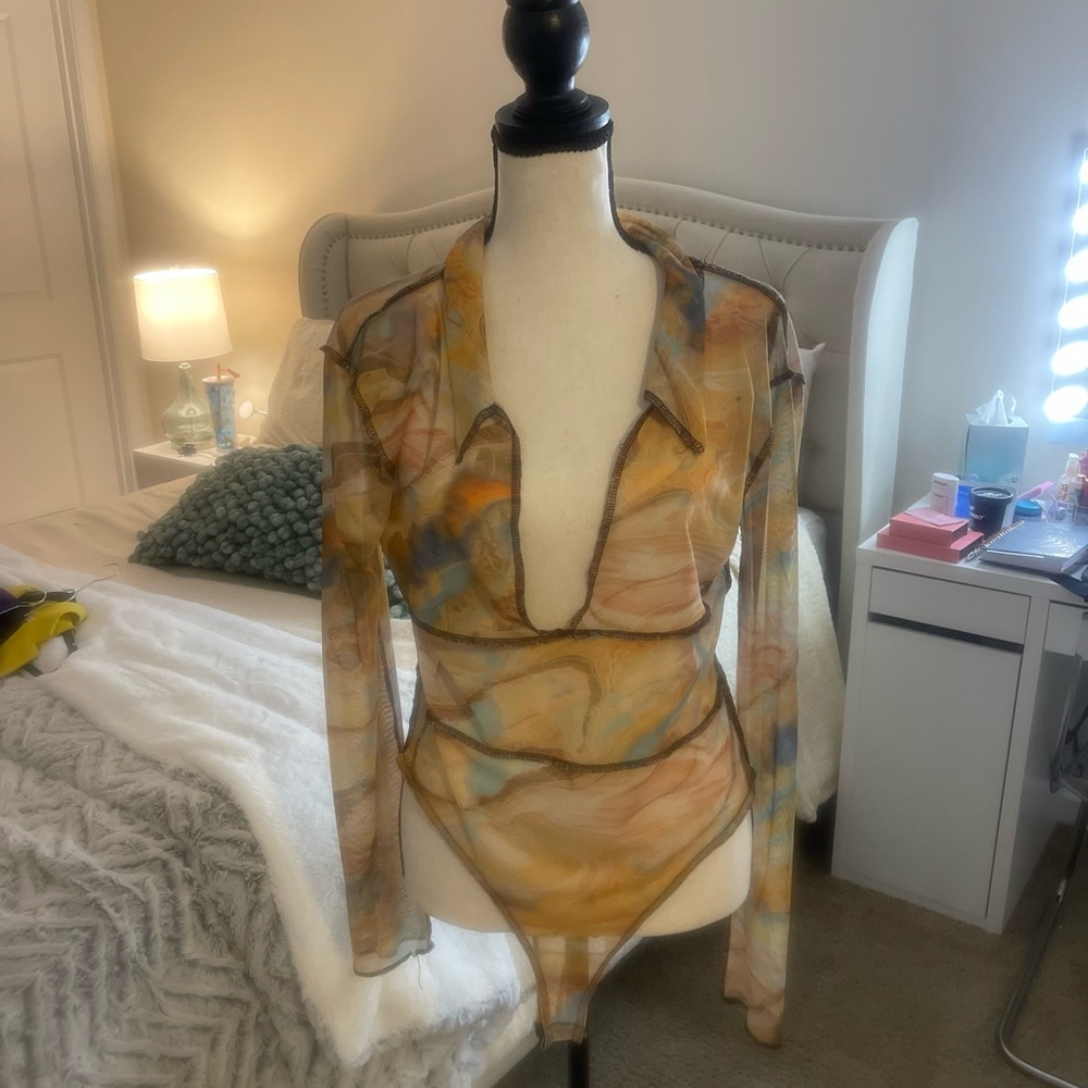 Pretty little things body see-through suit. Multi color